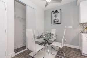 a room with a sink and a mirror