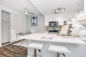 a kitchen with a table in a room
