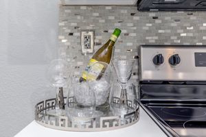 a bottle of wine sitting on top of a counter
