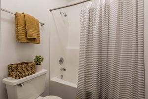 Bathroom with Bathtub  - Glenridge Apartments - Glendale - Arizona