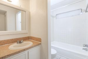 Bathroom with tan countertops