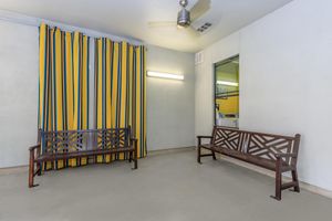 a yellow chair in a room