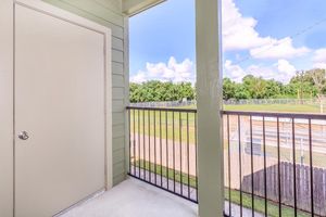 Private balcony with views of blue sky with clouds