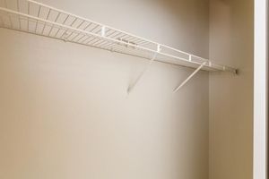 Walk-in closet with shelves for extra storage