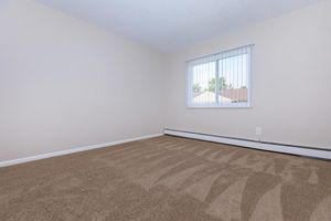 SPACIOUS CARPETED BEDROOMS AT SUSSEX WEST APARTMENTS