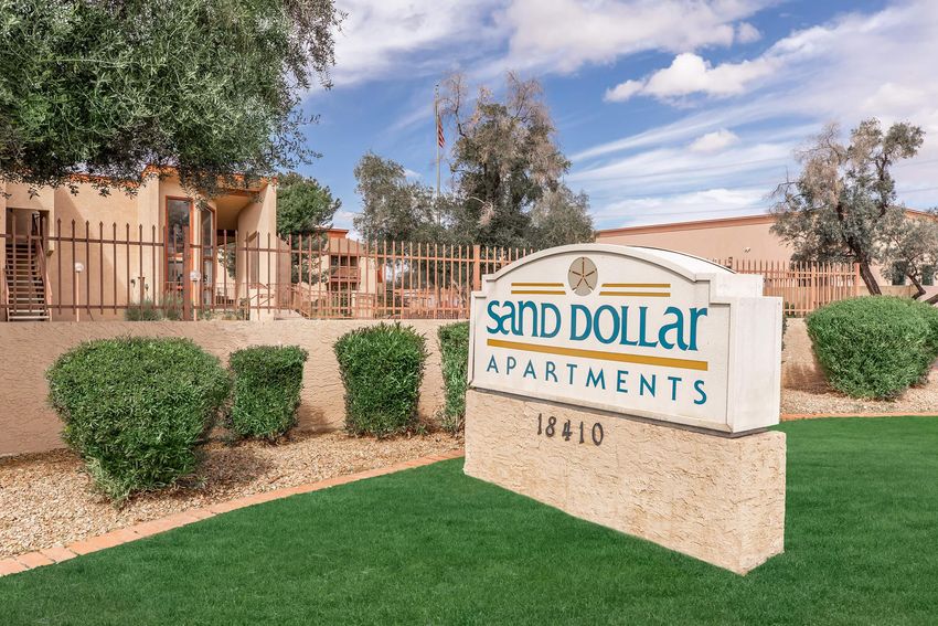 Entrance sign at Sand Dollar.