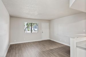 Spacious studio apartment entryway and living space